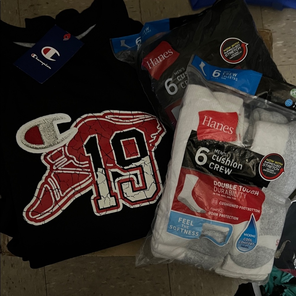 Champion Black crewneck with Red and White Logo along with 2 six in a pack socks